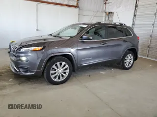 2018 Jeep Cherokee Overland with VIN 1C4PJMJXXJD594749, listed as a Copart auction lot 56049145 with 178,471 mi miles and Salvage title. Bid and sale history available at DreamBid. Image 1.