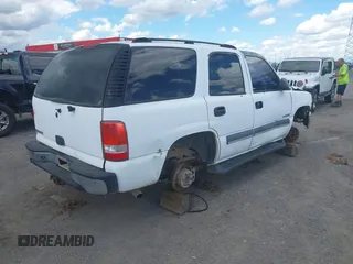 2003 Chevrolet Tahoe LS with VIN 1GNEC13V23R317327, listed as a IAAI auction lot 42183565 with 267,057 mi miles and . Bid and sale history available at DreamBid. Image 4.
