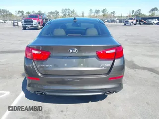 2014 Kia Optima EX z VIN 5XXGN4A71EG346924, wystawiony jako IAAI lot #41863871 z przebiegiem 230 605 mil mil oraz . Historia ofert i sprzedaży dostępna na DreamBid. Obrazek 15.