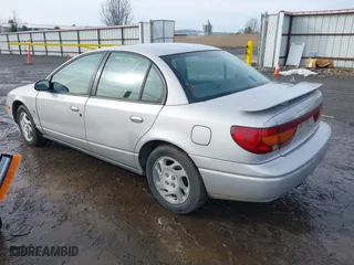 2000 Saturn SL with VIN 1G8ZJ527XYZ218993, listed as a IAAI auction lot 41603358 with 237,150 mi miles. Bid and sale history available at carsss.com. Image 3.