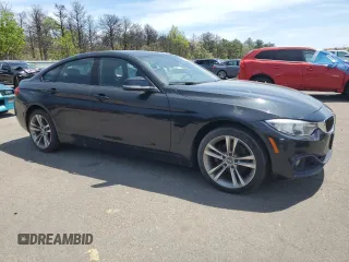 2015 BMW 4 Series 428i xDrive z VIN WBA4C9C56FD331197, wystawiony jako Copart lot #56714895 z przebiegiem 126 386 mil mil oraz Czysty tytuł • Clean title. Historia ofert i sprzedaży dostępna na DreamBid. Obrazek 4.