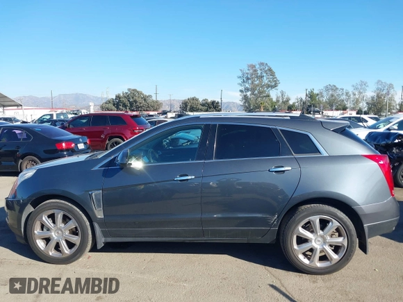 2013 Cadillac SRX Premium Collection z VIN 3GYFNEE37DS525612, wystawiony jako IAAI lot #41344221 z przebiegiem 119 573 mil mil oraz . Historia ofert i sprzedaży dostępna na DreamBid. Obrazek 15.
