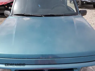 1996 Chevrolet Tracker z VIN 2CNBJ1869T6903615, wystawiony jako Copart lot #49690055 z przebiegiem 144 821 mil mil oraz Szkoda całkowita • Salvage title. Historia ofert i sprzedaży dostępna na DreamBid. Obrazek 11.