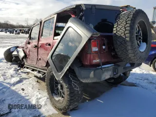2021 Jeep Wrangler Unlimited Sport Altitude with VIN 1C4HJXDG2MW544163, listed as a Copart auction lot 86496084 with 49,737 mi miles and Salvage Title. Bid and sale history available at carsss.com. Image 2.
