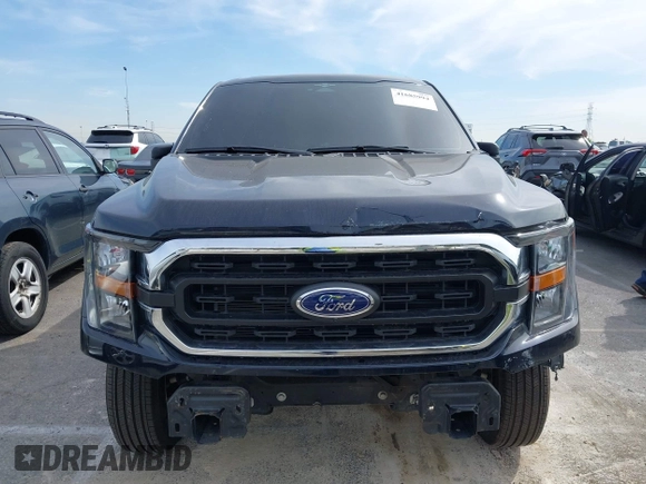 2023 Ford F-150 XL with VIN 1FTMF1C52PKG05729, listed as a IAAI auction lot 41685994 with 12,805 mi miles and . Bid and sale history available at carsss.com. Image 12.