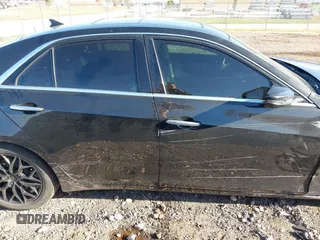 2014 Cadillac CTS Luxury AWD z VIN 1G6AX5SX9E0177017, wystawiony jako IAAI lot #42038429 z przebiegiem 113 656 mil mil oraz . Historia ofert i sprzedaży dostępna na DreamBid. Obrazek 13.
