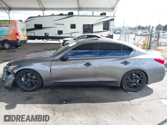 2015 Infiniti Q50 Premium with VIN JN1BV7AP1FM330183, listed as a IAAI auction lot 41788224 with 139,818 mi miles. Bid and sale history available at carsss.com. Image 14.