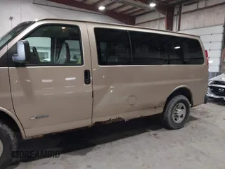 2005 Chevrolet Express Passenger with VIN 1GAHG35U651173253, listed as a IAAI auction lot 41966197 with 368,386 mi miles and . Bid and sale history available at DreamBid. Image 6.