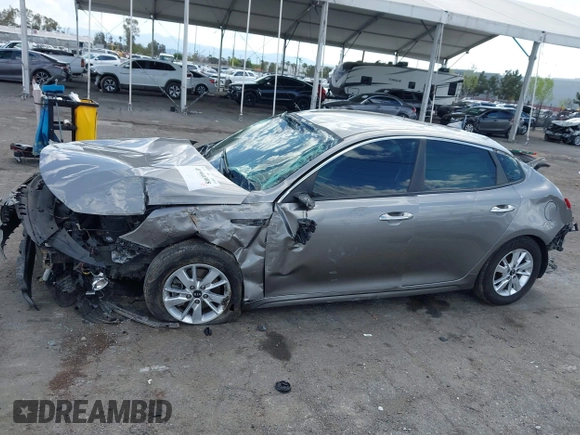 2018 Kia Optima LX z VIN 5XXGT4L38JG228380, wystawiony jako IAAI lot #41960308 z przebiegiem 43 317 mil mil oraz . Historia ofert i sprzedaży dostępna na DreamBid. Obrazek 14.