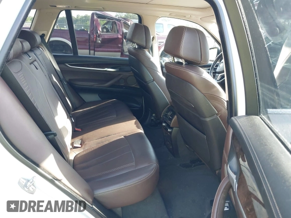 2015 BMW X5 xDrive35i z VIN 5UXKR0C53F0K58025, wystawiony jako IAAI lot #42222805 z przebiegiem 95 979 mil mil oraz . Historia ofert i sprzedaży dostępna na DreamBid. Obrazek 8.