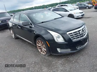 2013 Cadillac XTS Luxury with VIN 2G61P5S34D9183065, listed as a IAAI auction lot 42665741 with 209,585 mi miles and . Bid and sale history available at DreamBid. Image 1.