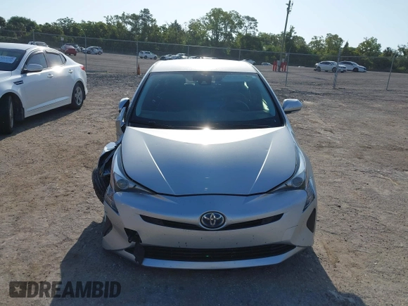 2017 Toyota Prius Two z VIN JTDKARFU8H3046058, wystawiony jako IAAI lot #42169692 z przebiegiem 79 226 mil mil oraz . Historia ofert i sprzedaży dostępna na DreamBid. Obrazek 13.