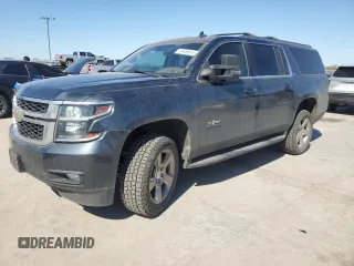 2020 Chevrolet Suburban LT z VIN 1GNSCHKC5LR186048, wystawiony jako Copart lot #49459095 z przebiegiem 98 925 mil mil oraz Czysty tytuł • Clean title. Historia ofert i sprzedaży dostępna na DreamBid. Obrazek 1.