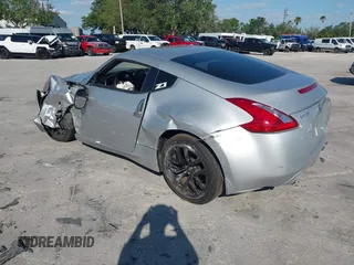 2017 Nissan 370Z with VIN JN1AZ4EHXHM951104, listed as a IAAI auction lot 41992380 with 118,356 mi miles. Bid and sale history available at carsss.com. Image 3.