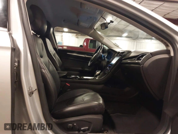 2016 Ford Fusion Titanium with VIN 3FA6P0K96GR150907, listed as a IAAI auction lot 42291933 with 200,463 mi miles and . Bid and sale history available at DreamBid. Image 5.