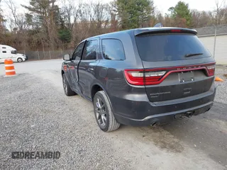 2015 Dodge Durango SXT with VIN 1C4RDJAG4FC784865, listed as a IAAI auction lot 40872452 with 145,877 mi miles and . Bid and sale history available at carsss.com. Image 3.