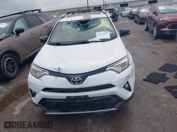 2016 Toyota RAV4 SE with VIN 2T3NFREV6GW262348, listed as a IAAI auction lot 42074087 with 114,791 mi miles and . Bid and sale history available at DreamBid. Image 12.