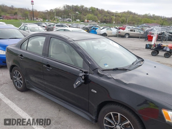 2015 Mitsubishi Lancer SE with VIN JA32V2FW2FU002303, listed as a IAAI auction lot 41927592 with 32,444 mi miles. Bid and sale history available at carsss.com. Image 6.