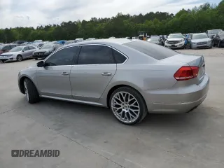 2014 Volkswagen Passat SEL Premium z VIN 1VWCN7A35EC073576, wystawiony jako Copart lot #52810825 z przebiegiem 113 067 mil mil oraz Szkoda całkowita • Salvage title. Historia ofert i sprzedaży dostępna na DreamBid. Obrazek 2.