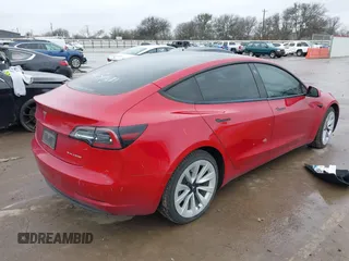 2021 Tesla Model 3 Long Range with VIN 5YJ3E1EB2MF079595, listed as a IAAI auction lot 41621546 with 45,616 mi miles. Bid and sale history available at carsss.com. Image 4.