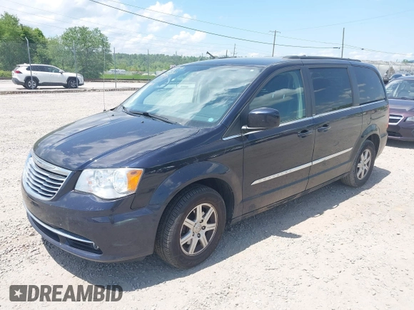 2011 Chrysler Town & Country Touring with VIN 2A4RR5DG7BR697932, listed as a IAAI auction lot 42231254 with 151,866 mi miles and . Bid and sale history available at DreamBid. Image 2.