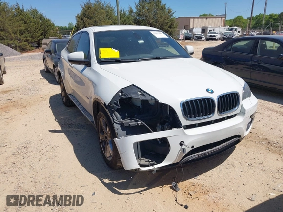 2014 BMW X6 xDrive35i with VIN 5UXFG2C53E0C44047, listed as a IAAI auction lot 42057685 with 145,912 mi miles. Bid and sale history available at carsss.com. Image 1.
