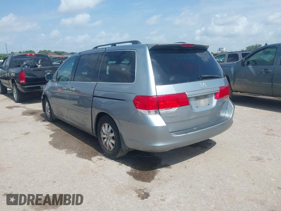 2010 Honda Odyssey EX with VIN 5FNRL3H42AB002679, listed as a IAAI auction lot 42692701 with 179,905 mi miles and . Bid and sale history available at DreamBid. Image 3.