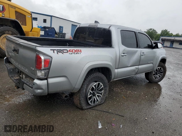 2023 Toyota Tacoma SR with VIN 3TMCZ5AN4PM566647, listed as a Copart auction lot 64062034 with 43,154 mi miles and Salvage title. Bid and sale history available at DreamBid. Image 3.