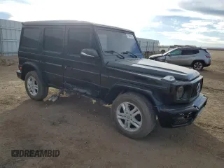 2004 Mercedes-Benz G-Class with VIN WDCYR49E54X143676, listed as a Copart auction lot 41368475 with 90,653 mi miles and Salvage Title. Bid and sale history available at carsss.com. Image 4.