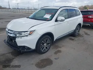 2016 Mitsubishi Outlander SE with VIN JA4AD3A33GZ033884, listed as a IAAI auction lot 41571675 with 142,405 mi miles. Bid and sale history available at carsss.com. Image 17.