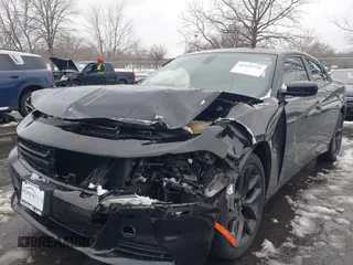 2022 Dodge Charger SXT with VIN 2C3CDXBG0NH157720, listed as a IAAI auction lot 41559731 with 21,062 mi miles and . Bid and sale history available at carsss.com. Image 6.