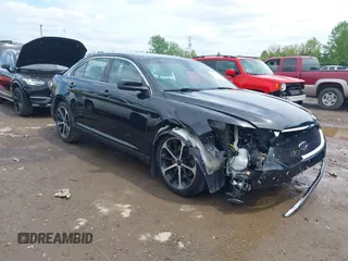 2015 Ford Taurus SHO z VIN 1FAHP2KT1FG196151, wystawiony jako IAAI lot #42187492 z przebiegiem 131 833 mil mil oraz . Historia ofert i sprzedaży dostępna na DreamBid. Obrazek 1.