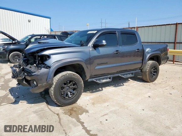 2021 Toyota Tacoma SR with VIN 3TMCZ5AN9MM451389, listed as a Copart auction lot 59191355 with 26,427 mi miles and Salvage title. Bid and sale history available at DreamBid. Image 1.