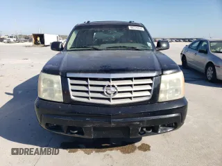 2004 Cadillac Escalade z VIN 1GYEC63T54R139039, wystawiony jako Copart lot #86274414 z przebiegiem 267 218 mil mil oraz Czysty tytuł • Clean title. Historia ofert i sprzedaży dostępna na DreamBid. Obrazek 5.