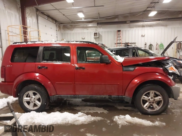 2009 Dodge Nitro SE with VIN 1D8GU28K79W522396, listed as a IAAI auction lot 41399429 with 148,727 mi miles and . Bid and sale history available at DreamBid. Image 13.