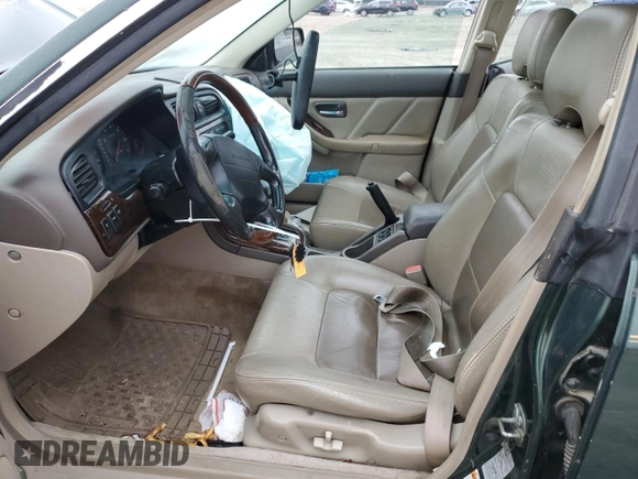 2001 Subaru Legacy Outback L.L. Bean с VIN 4S3BH806817626117, выставлен на аукционе Copart как лот 43201875 с пробегом 213 994 миль миль и Списание • Salvage title. История ставок и продаж доступна на DreamBid. Изображение 7.