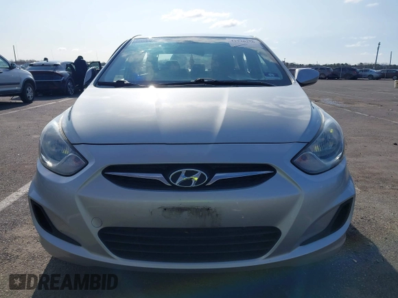 2013 Hyundai Accent GLS with VIN KMHCT4AE4DU477465, listed as a IAAI auction lot 41930256 with 48,877 mi miles and . Bid and sale history available at carsss.com. Image 12.