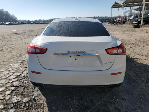 2016 Maserati Ghibli z VIN ZAM57XSAXG1167773, wystawiony jako Copart lot #46607705 z przebiegiem 62 421 mil mil oraz Szkoda całkowita • Salvage title. Historia ofert i sprzedaży dostępna na DreamBid. Obrazek 6.