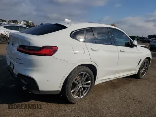 2019 BMW X4 xDrive30i with VIN 5UXUJ3C5XKLG54286, listed as a Copart auction lot 77333284 with 99,771 mi miles and Salvage Title. Bid and sale history available at carsss.com. Image 3.