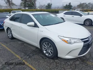 2017 Toyota Camry Hybrid LE with VIN 4T1BD1FK9HU218627, listed as a IAAI auction lot 41784795 with 105,481 mi miles. Bid and sale history available at carsss.com. Image 1.