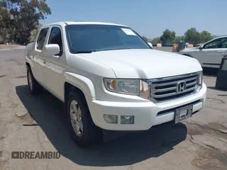 2012 Honda Ridgeline RTL z VIN 5FPYK1F57CB455267, wystawiony jako IAAI lot #42462296 z przebiegiem 186 451 mil mil oraz . Historia ofert i sprzedaży dostępna na DreamBid. Obrazek 1.