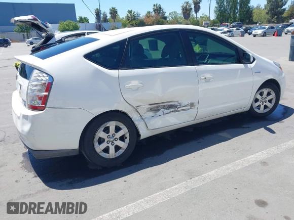2009 Toyota Prius with VIN JTDKB20U397855359, listed as a IAAI auction lot 42223095 with 263,129 mi miles and . Bid and sale history available at DreamBid. Image 4.