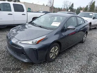 2021 Toyota Prius L Eco with VIN JTDKAMFU2M3143138, listed as a IAAI auction lot 41658263 with 102,718 mi miles. Bid and sale history available at carsss.com. Image 14.
