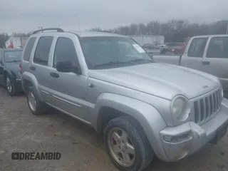2003 Jeep Liberty Limited with VIN 1J4GL58K73W592677, listed as a IAAI auction lot 41394407 with 1 mi miles. Bid and sale history available at carsss.com. Image 1.