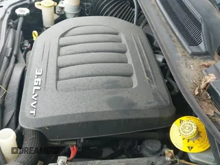 2018 Dodge Grand Caravan GT with VIN 2C4RDGEG4JR284525, listed as a IAAI auction lot 43390054 with 175,224 mi miles and . Bid and sale history available at DreamBid. Image 19.