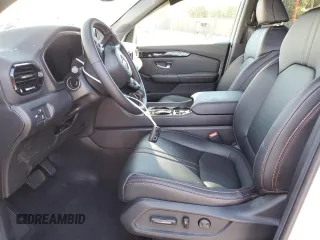 2025 Honda Pilot TrailSport with VIN 5FNYG1H65SB004479, listed as a Copart auction lot 70917734 with 7,582 mi miles and Salvage Title. Bid and sale history available at carsss.com. Image 7.