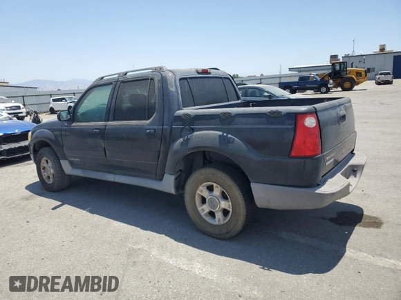 2001 Ford Explorer Sport Trac z VIN 1FMZU77E61UB26259, wystawiony jako Copart lot #62541145 z przebiegiem 258 417 mil mil oraz Czysty tytuł • Clean title. Historia ofert i sprzedaży dostępna na DreamBid. Obrazek 2.