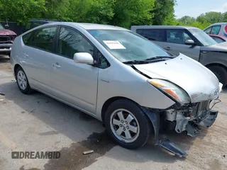 2007 Toyota Prius z VIN JTDKB20U273214210, wystawiony jako IAAI lot #42435640 z przebiegiem 224 312 mil mil oraz . Historia ofert i sprzedaży dostępna na DreamBid. Obrazek 1.