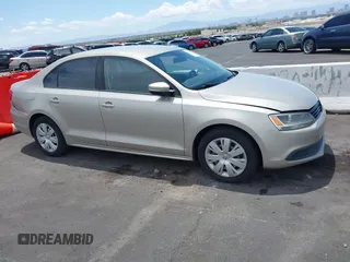 2014 Volkswagen Jetta SE with VIN 3VWD17AJ9EM271431, listed as a IAAI auction lot 42419304 with 143,599 mi miles and . Bid and sale history available at DreamBid. Image 12.
