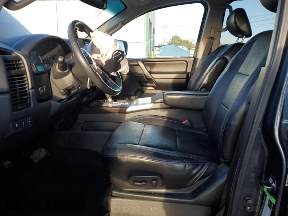 2014 Nissan Titan S with VIN 1N6AA0EC2EN511673, listed as a Copart auction lot 41703295 with 81,662 mi miles and Salvage Title. Bid and sale history available at DreamBid. Image 7.